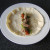Watercress salad and turkey is arranged on tortilla wrap