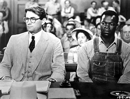 Screenshot from the film To Kill a Mockingbird (1962) with Gregory Peck as Atticus and Brock Peters as Tom Robinson