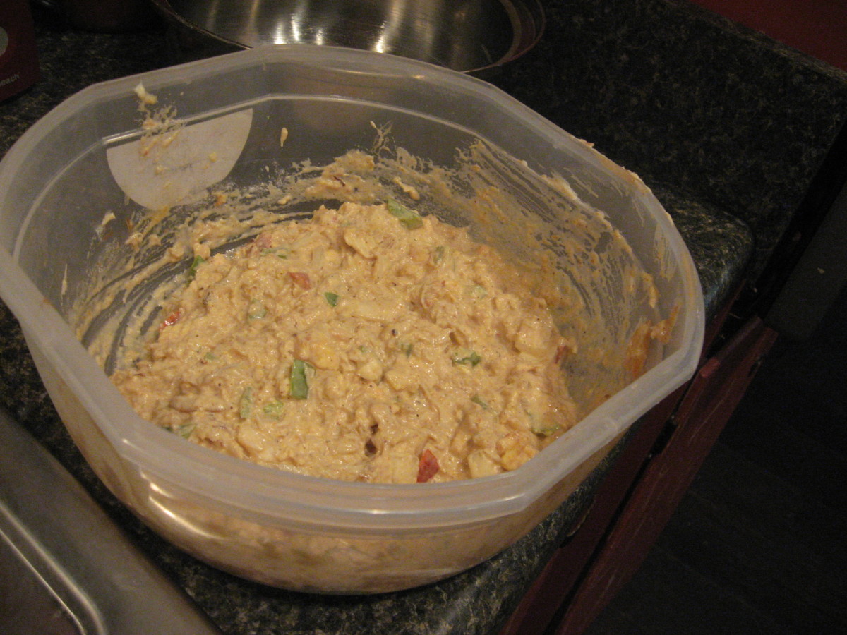 After other ingredients have been combined, fold in crab meat gently.