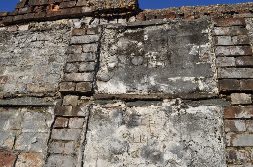 It's not unusual to see a date and cross scratched into the fronts of oven tombs, but these read "KEEP OUT" and the date 1981, which is when this section was closed permanently. 
