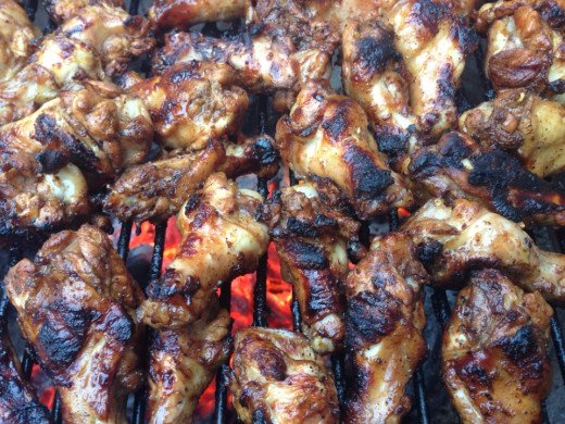 Wings and drumettes on grill