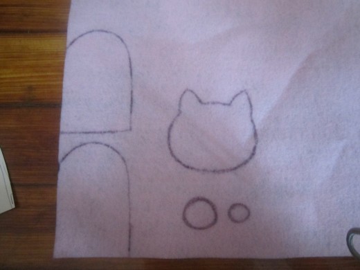 Trace your body template and draw your shapes out on to the felt using a pencil or pen.