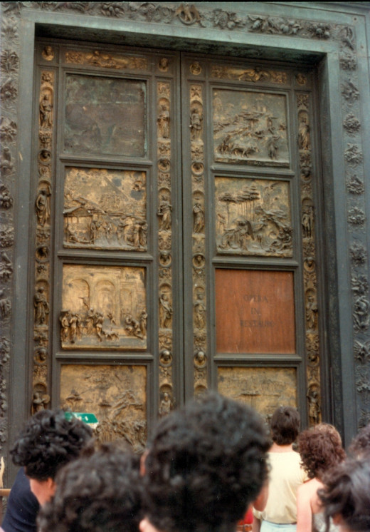 The Baptistery Church, with gold leaf on its doors