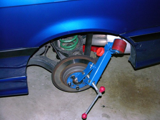 A fender roller that bolts to your wheel hub and rotates along the inner lip of your car's fenders to flatten the edge for more wheel clearance on the outside.