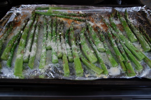 Asparagus cooking with Parmesan