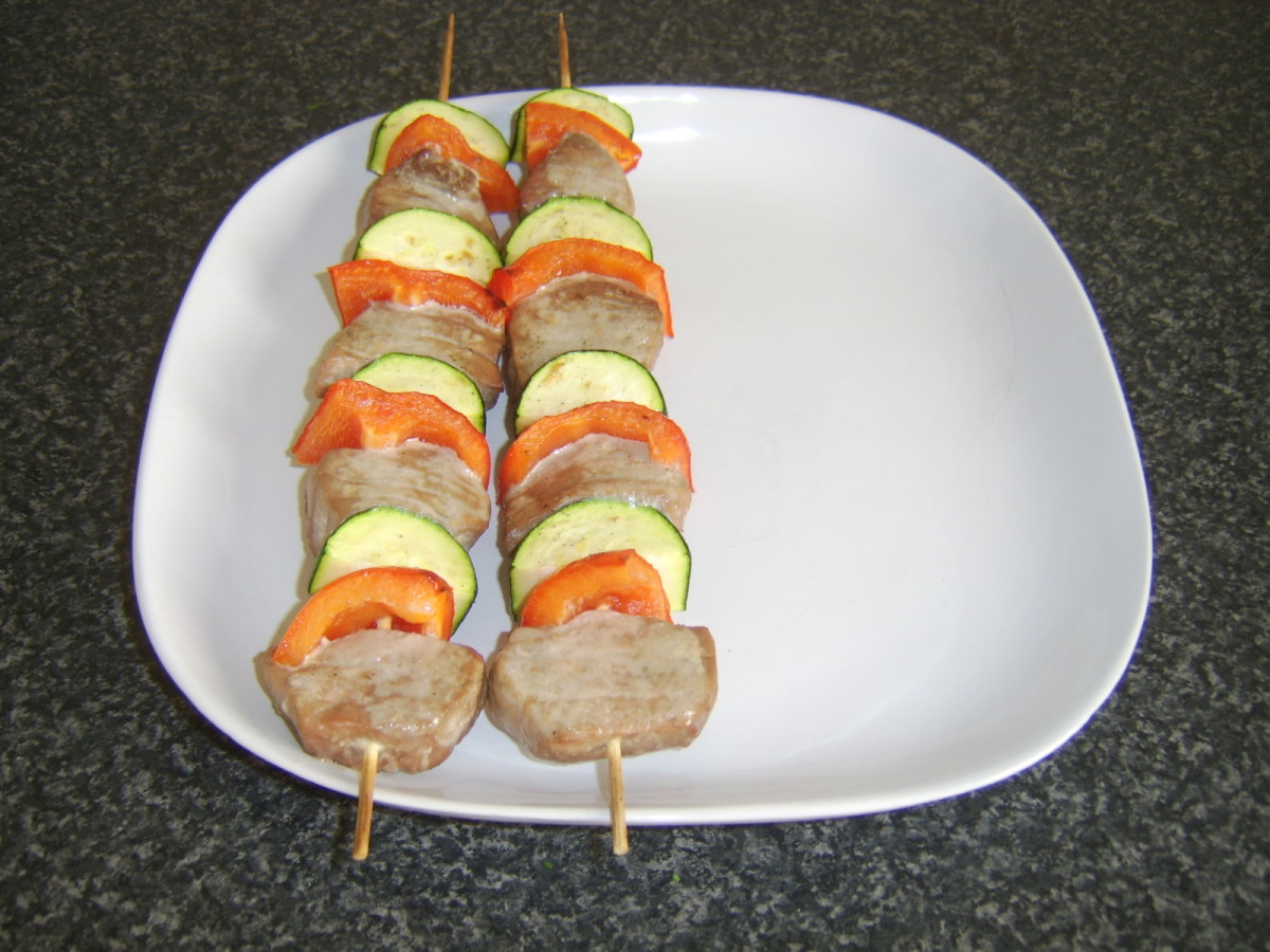 Tuna loin shish kebabs are plated