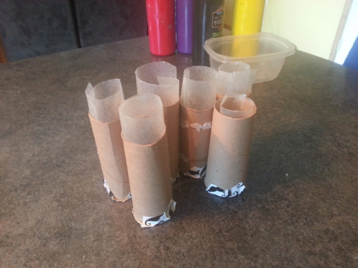 Empty toilet paper rolls make the perfect mold for making sidewalk chalk. 