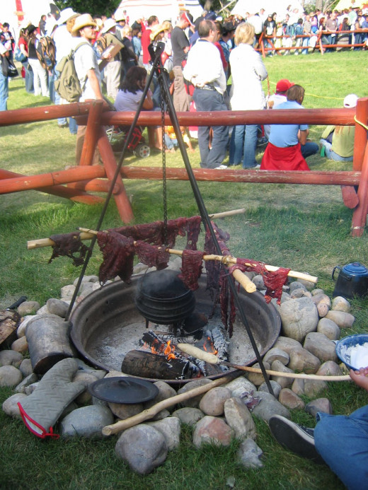 Traditional method of drying meat for pemmican demonstrated at Calgary Stampede