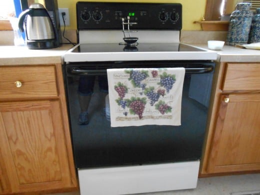 Hang kitchen towels on the bar of your oven door to keep them dry.