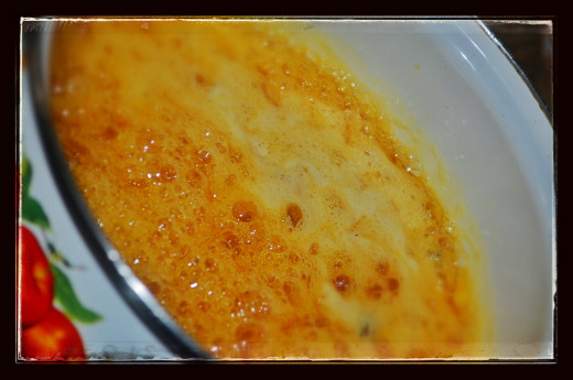 melt jaggery in little quantity of water and cardamom