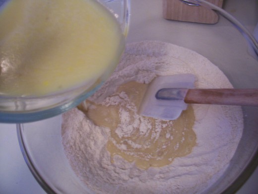 Pour the "wet" ingredients into the well of the "dry" ingredients, and mix until just blended.