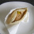 Pakora sauce is added to fragrant Indian rice pitta bread sandwich