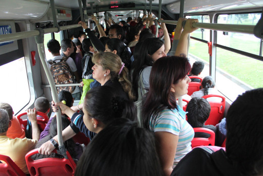 No one I know of enjoys a ride in a crowded bus. Why make it even worse?
