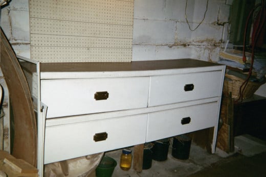 Old fashioned pattern drawers used in stores back in the day... stacked as a work station in basement.  Paid $25 for the 2.