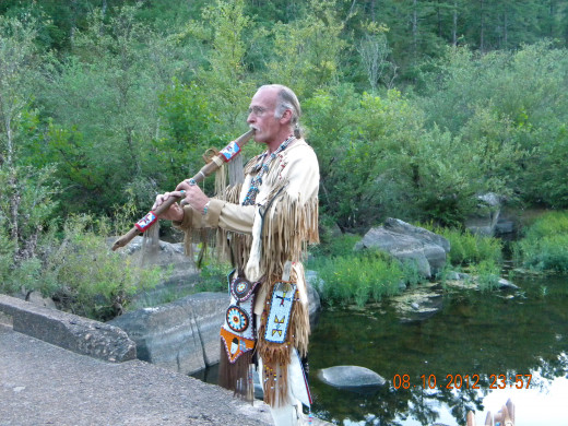 Native American Tourist - playing a Native American courting flute at Silver Mines, Missouri. (Used with permission)
