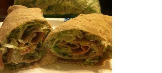 A whole wheat tortilla piled with shredded lettuce, onions, peppers, tomatoes and just two ounces of ham is super filling!