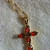 Garnet and gold cross