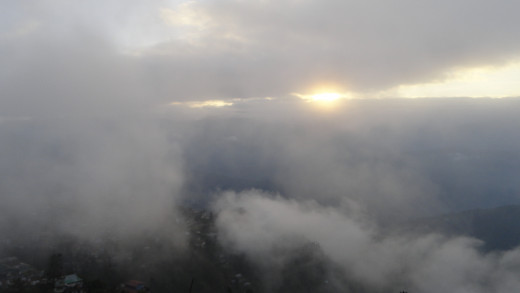 Clouds embracing the Darjeeling Sun