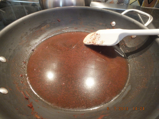 I like to deglaze the pan with some of the vinegar. It gets all the cinnamon off the bottom.