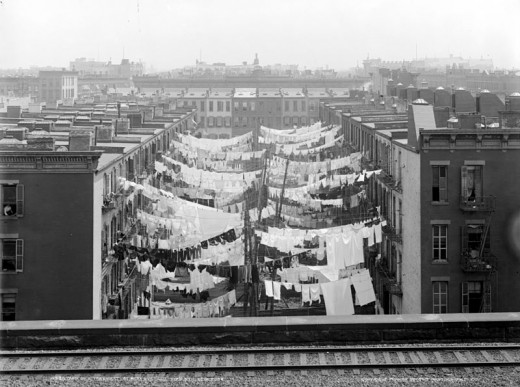 A New York City tenement complex from around 1900. These tenements housed many people in tight quarters.