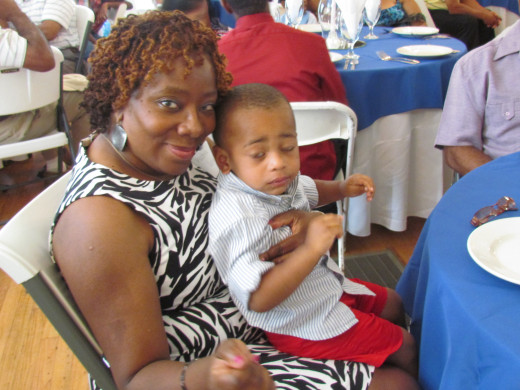 Kasia, the daughter of my oldest sister Janie, takes a photo with her grandson, Christian.