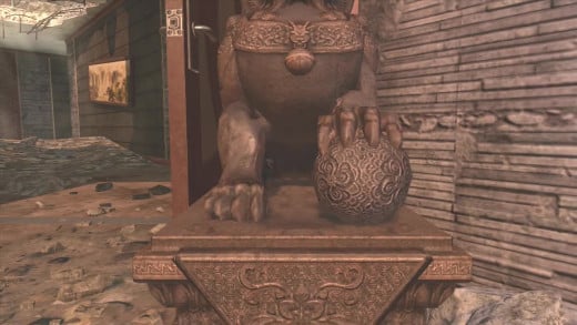 The Dragon Orb is under the claw of the Dragon Statue.
