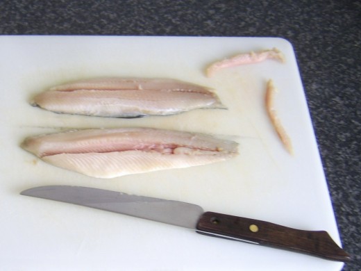 Pinboning herring fillets