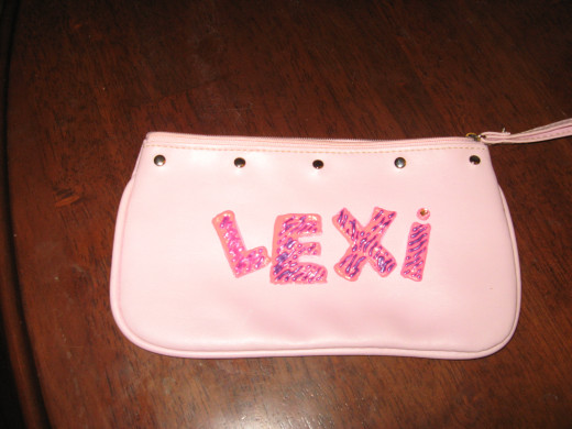 To personalize this little purse, I  used slick fabric paint and acrylic paint.