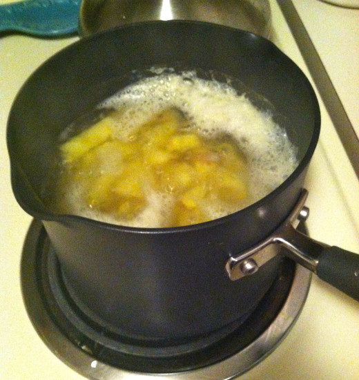 Boil the potatoes until they are soft with a fork.