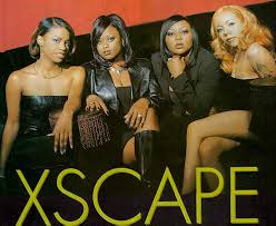 Kandi is at the far left in group photo of Xscape