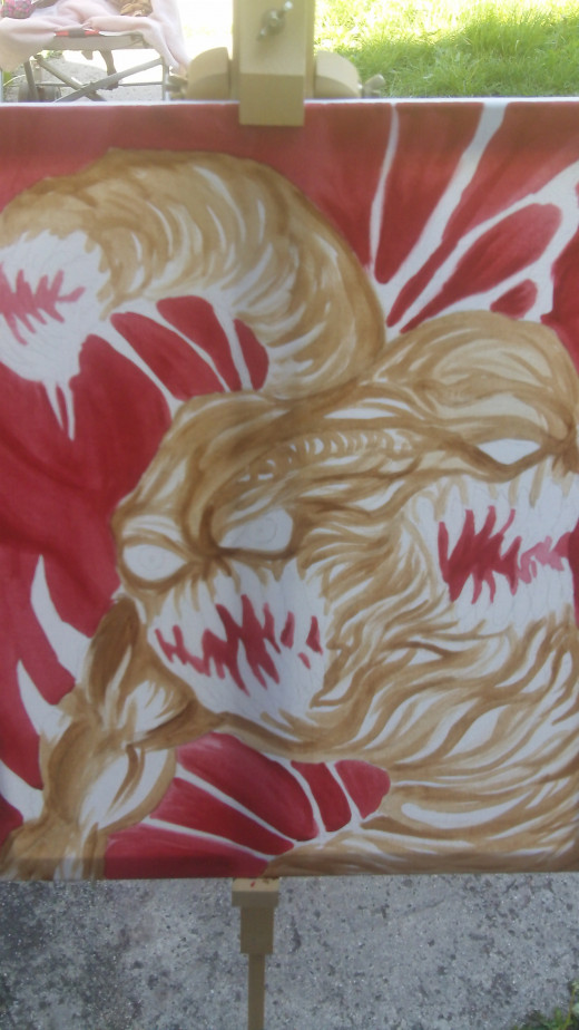 The base coat for the background red is complete