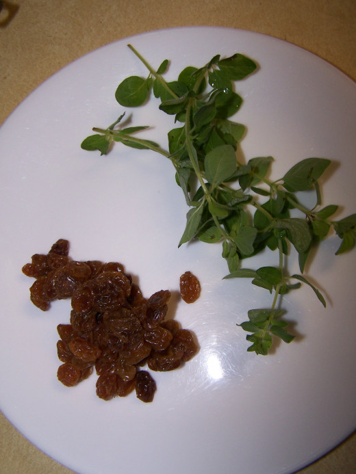 This is fresh basil and golden raisins that are part of the recipe.