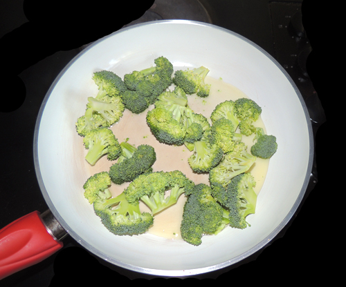 in the same pan with a splash extra olive oil, saute broccoli briefly - set aside