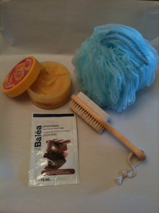A skin brush pictured with other exfoliation items.  This particular brush has a pumice stone on the other side that is used for facial exfoliation.  You may want a brush with a longer handle for body brushing in order to reach the whole back.
