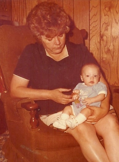 Mom and one of her grandchildren (Personal photo).