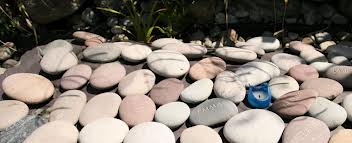 The children who have passed away have their names on these pebbles of love.