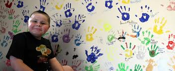 Proudly presenting these colourful handprints.