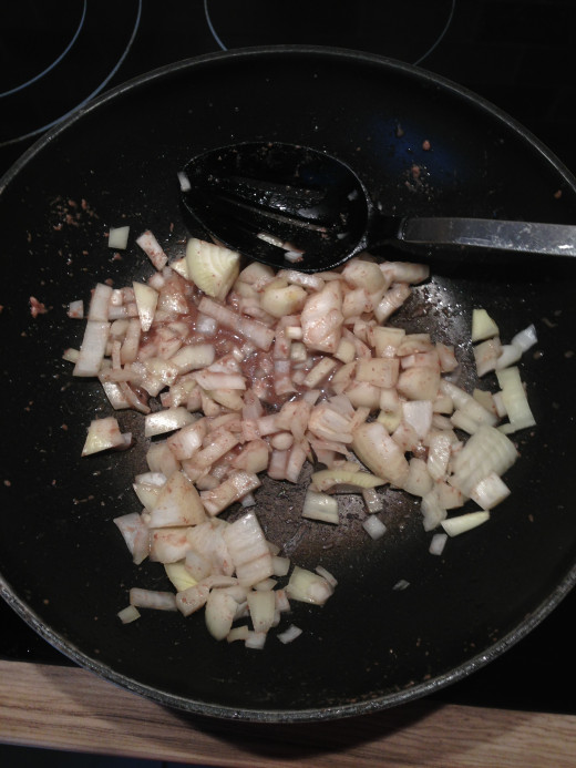 Frying the onions in the beef juices ready to go in the pot for the beef stew