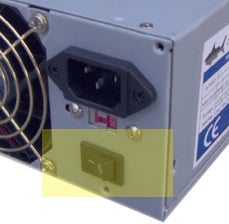 Example of back of power supply often seen on the back of a computer.