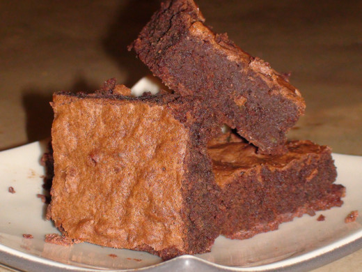Dark chocolate brownies made with coconut flour and avocado. Bet you won't taste either! Try these brownies straight from the freezer for a cold summer treat!