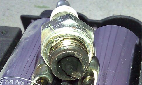 Figure 2.  Spark Plug:  Burned Out or Covered in Carbon