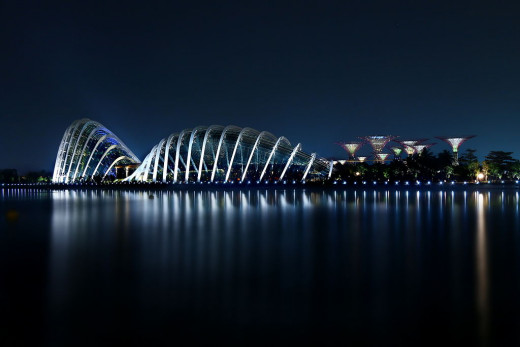 The Flower Dome and Cloud Forest at night as seen from across the Marina Reservoir