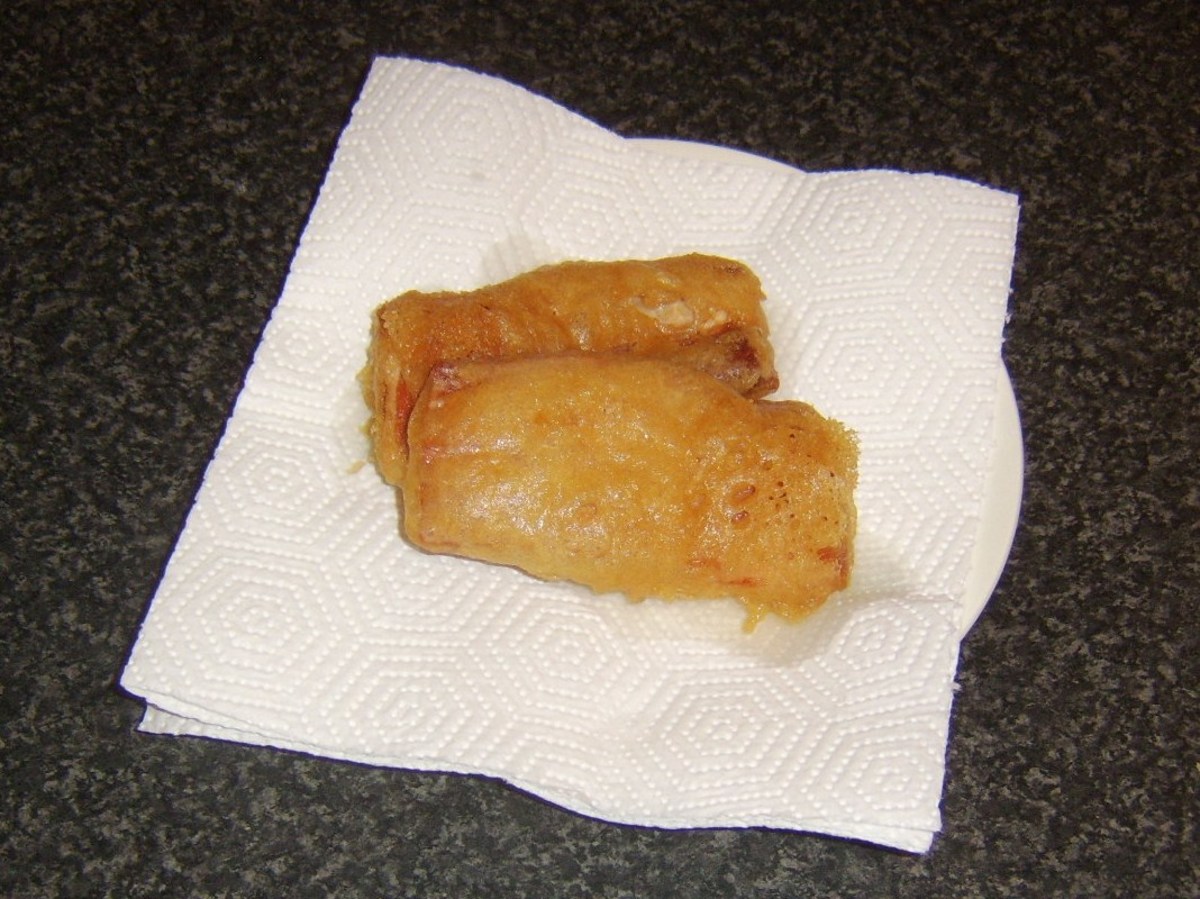 Ham fritters are drained on kitchen paper