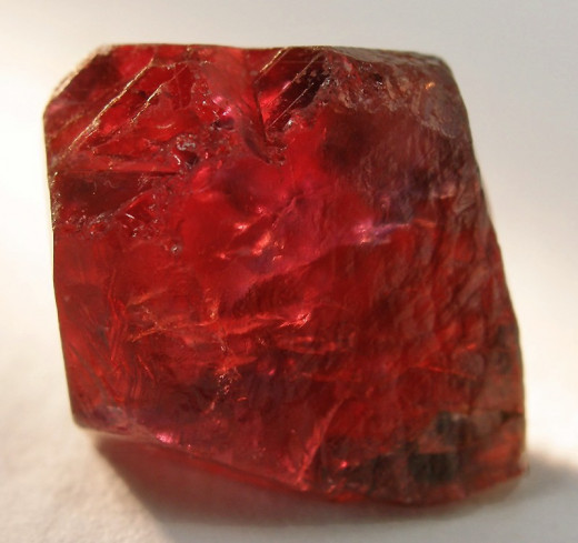 Corundum, when red, is called a ruby - this is a ruby in it's raw form.