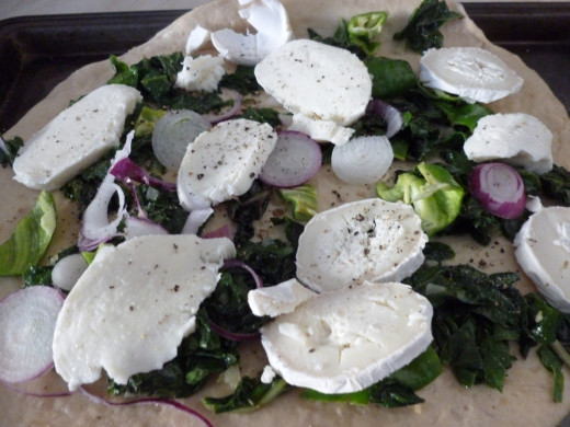 Uncooked chard and cheese pizza