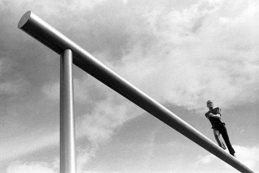 The balance beam of happiness takes a lil' training, but well worth your time. (Photo: www.hoogrrl.com) 