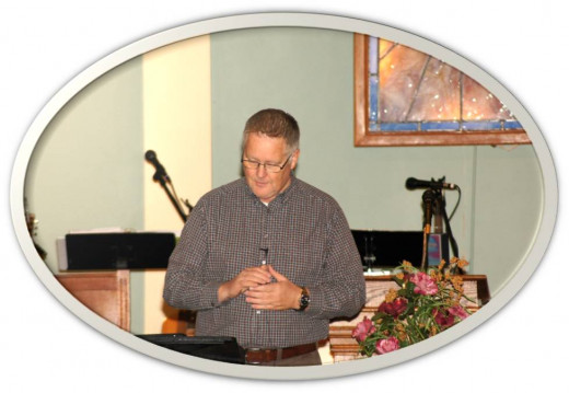 Pastor Jim Lucas leading prayer. 