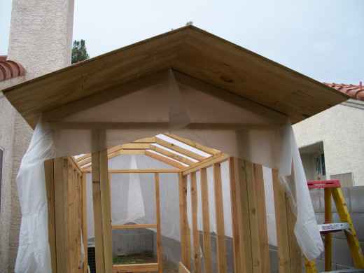 Front view after installation of first two roof sections.