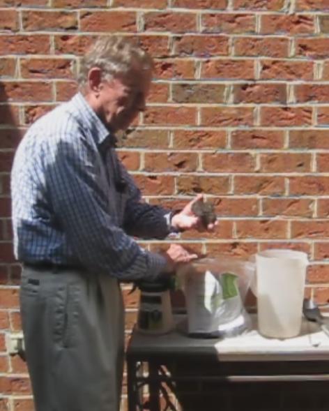 Measuring Out 6 Ounces of Humus Compost