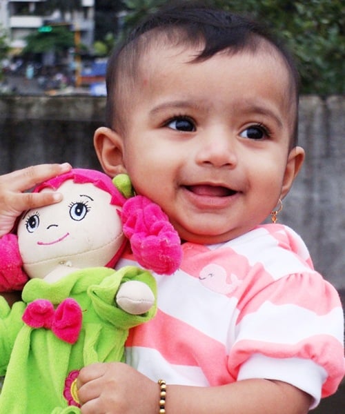 A Kid with her doll